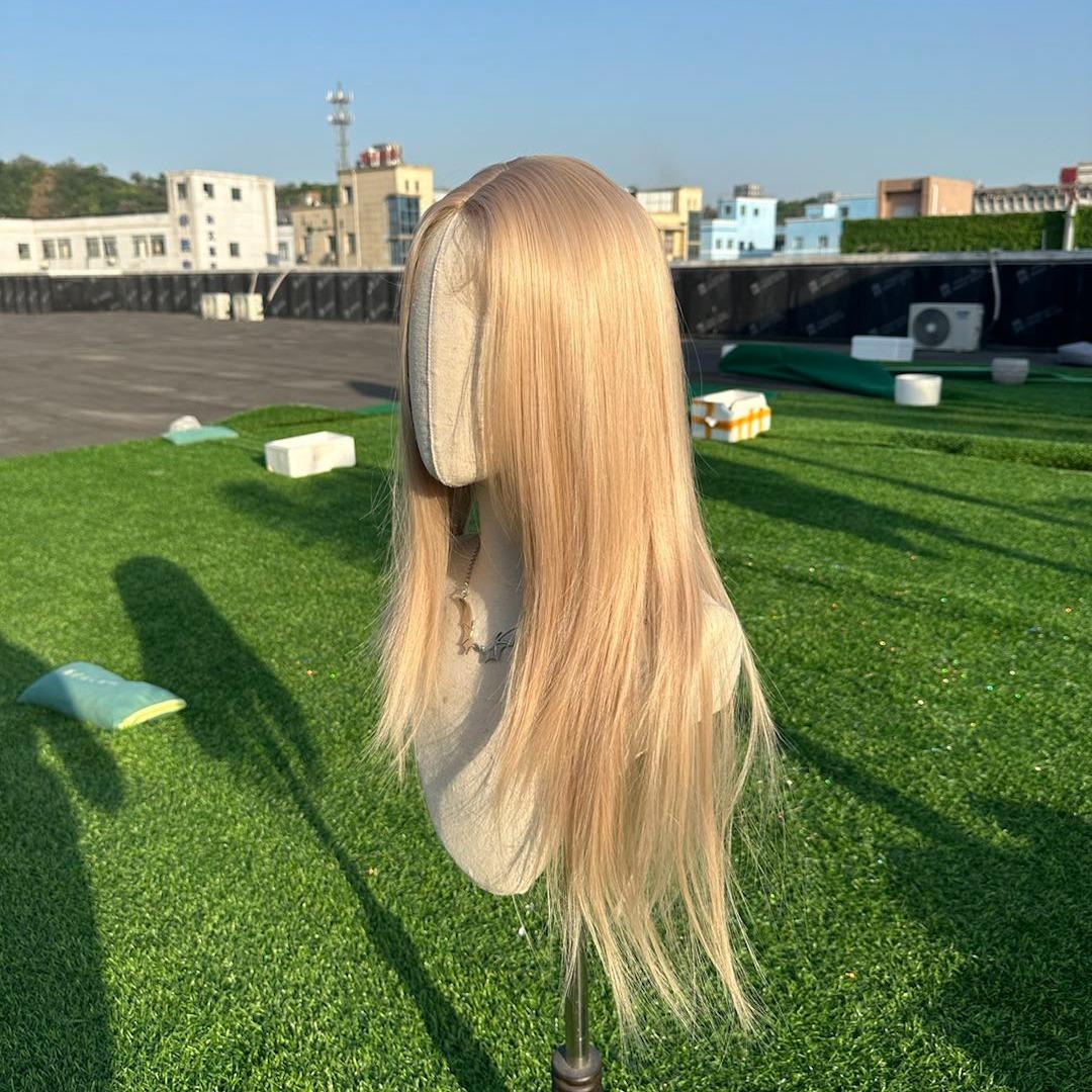 Stella-Wigked Nano Lace 26 Inches Ultimate Mixed Blonde , Layered Long Style, Middle Part with Baby Hairs.
